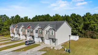 323 Cedar Island Trail, Holly Ridge, NC 28445 — 3-bedroom townhome in The Landing At Folkstone, Holly Ridge, NC, photo 3 of 36: 6_drone