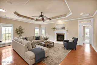 3516 Gladehill Lane, Leland, NC 28451 — 3-bedroom townhome in Brunswick Forest, Leland, NC, photo 10 of 68: 3516 Gladehill Lane Living Room VS