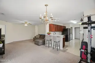 103 W Heron Court, Elizabeth Cty, NC 27909 – photo 7: 103 W Heron LR DR Kitchen Bar new