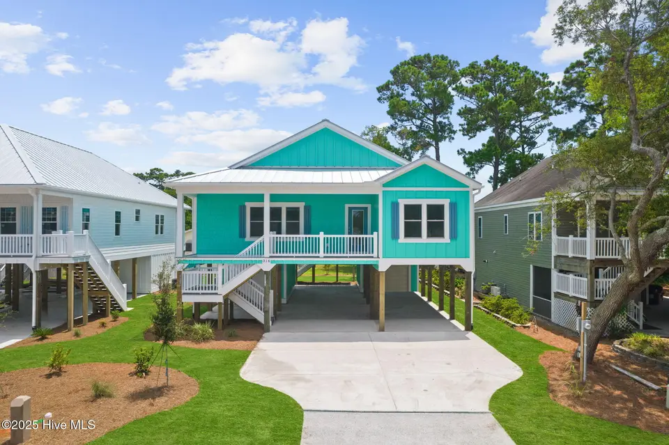 228 NE 56th Street, Oak Island, NC 28465 – photo 1 of 34: 1-web-or-mls-CAMMediaLLC.com (3 of 34)
