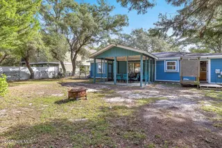 209 NE 56th Street, Oak Island, NC 28465 – photo 5: 11-Final 209 NE 56th St OKI-RJREM-9389