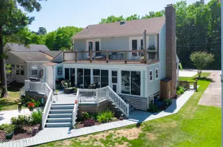 2313 Waccamaw Shores Road, Lake Waccamaw, NC 28450 – photo 18: Back of Home - 2 great decks!