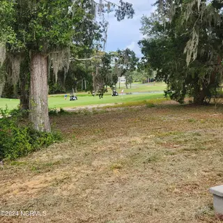 416 Shoreline Drive W, Sunset Beach, NC 28468 – photo 2: 20240911_154218