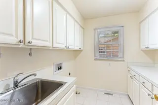 16 Bogie Drive, Whispering Pines, NC 28327 – photo 24: Laundry room