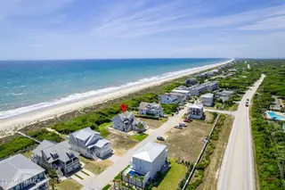 125 Roosevelt Drive, Pine Knoll Shores, NC 28512 — 5-bedroom home in Roosevelt Beach, Pine Knoll Shores, NC, photo 1 of 61: Oceanfront PKS home in Roosevelt Beach