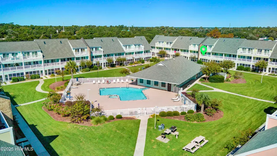 9201 Coast Guard Road H206, Emerald Isle, NC 28594 – photo 1 of 51: PB-Quad-Pool-Drone-2023