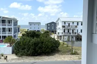 128 W Dolphin Drive, Oak Island, NC 28465 – photo 9: Look at that Ocean