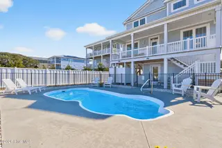 3228 E Dolphin Drive, Oak Island, NC 28465 – photo 6: KahunaPhoto.com-109