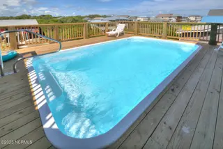 4019 E Beach Drive, Oak Island, NC 28465 – photo 4: Paradis Marin Pool
