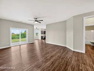 501 Millbrooke Circle, Elizabeth City, NC 27909 – photo 21: Living Room To Dining/Kitchen