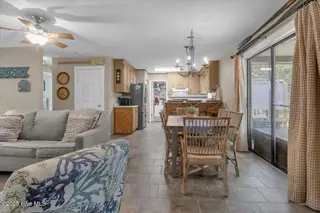 209 NE 56th Street, Oak Island, NC 28465 – photo 12: 21-Final 209 NE 56th St OKI-RJREM-9429