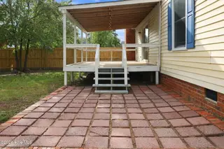 2405 Harness Court, Greenville, NC 27858 — 3-bedroom home in Tucker East, Greenville, NC, photo 7 of 44: Covered Deck & Patio View