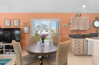 117 Island Quay Court, Atlantic Beach, NC 28512 – photo 13: Open concept dining room and kitchen