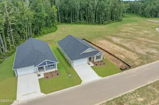 7131 Woodline Drive SW, Sunset Beach, NC 28468 – photo 2: Seaside Palms Venture 7131 Woodline Dr L