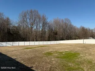 511 Heron Drive, Goldsboro, NC 27534 – photo 15: back yard from L corner