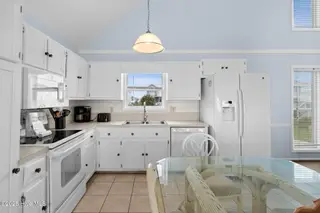 3229 E Beach Drive, Oak Island, NC 28465 – photo 14: 19-web-or-mls-CAMMediaLLC.com 3229-23