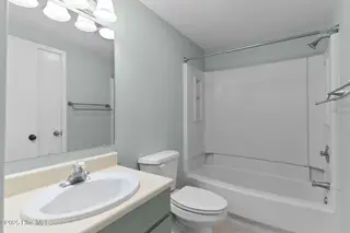 231 Saint Luke Court, Wilmington, NC 28409 — 2-bedroom waterfront townhome in Caneel Cove, Wilmington, NC, photo 19 of 38: 41-web-or-mls-BTS02073