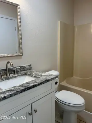 1080 Valley Drive SW, Calabash, NC 28467 — 2-bedroom home in Hidden Valley, Calabash, NC, photo 22 of 31: Guest Bath