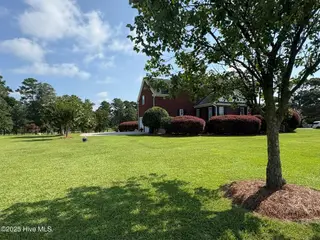 25 Muirfield Drive, Whiteville, NC 28472 – photo 10: Perfectly landscaped