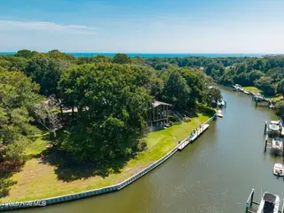 159 Loblolly Drive, Pine Knoll Shores, NC 28512 – photo 2: 300' of Canal Frontage