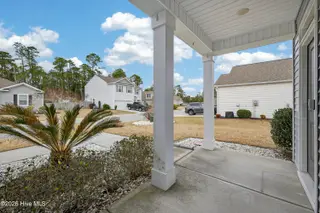 825 Seathwaite Lane SE, Leland, NC 28451 – photo 4: 825SeathwaiteLaneSE-5 Side front porch