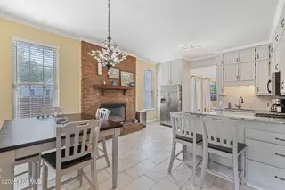 128 E Railroad Street, La Grange, NC 28551 – photo 10: Kitchen/ dining w electric fireplace