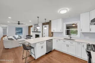 113 Yorkshire Lane, Wilmington, NC 28409 — 3-bedroom home in Lansdowne Estates, Wilmington, NC, photo 12 of 48: Kitchen towards living room