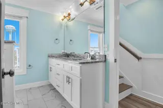 105 E Beach Drive, Oak Island, NC 28465 – photo 12: 105 E Beach pict23