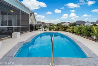 1388 Dunes Boulevard SW, Ocean Isle Beach, NC 28469 – photo 6: LONG POOL VIEW