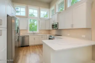 170 NE 31st Street, Oak Island, NC 28465 – photo 8: 170 NE 31st St Oak Island NC-large-013-0