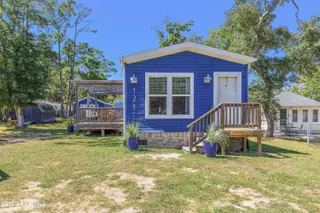 121 NE 78th Street, Oak Island, NC 28465 – photo 1: 121 NE 78th-1