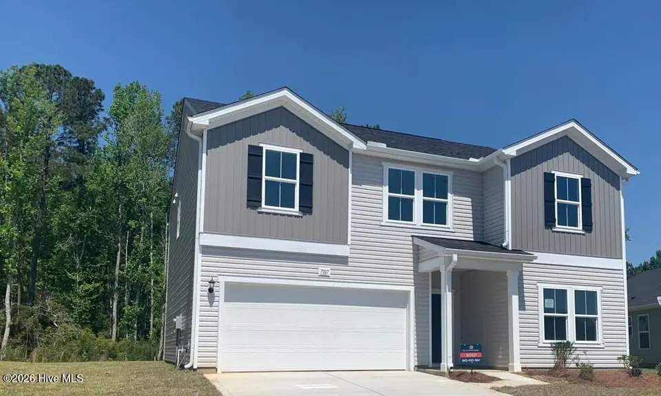 7107 Woodline Drive SW, Sunset Beach, NC 28468 – photo 1 of 55: Lot 33 Exterior Photo