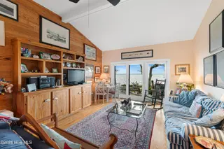 590 Westport Drive H1 Westport, Pine Knoll Shores, NC 28512 – photo 6: Living room with sound views