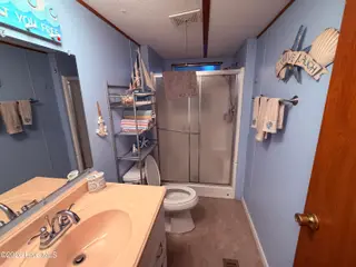 1321 Caison Avenue SW, Supply, NC 28462 — 2-bedroom manufactured home in Holiday Acres, Supply, NC, photo 9 of 24