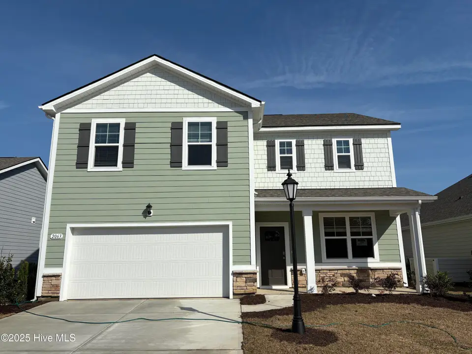 1237 Woodhouse Drive NW, Ash, NC 28420 – photo 1 of 34: Lot 108 Rich Square