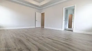 1635 Pecan Drive Lot 26, Nashville, NC 27856 – photo 22: primary bedroom with laminate flooring