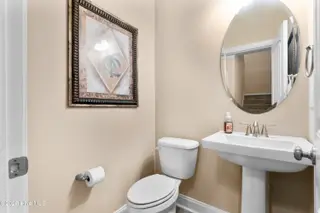 418 Goldenleaf Circle, Whispering Pines, NC 28327 – photo 8: downstairs bathroom