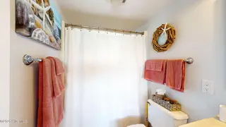 8801 Reed Drive 115, Emerald Isle, NC 28594 – photo 17: Primary Bedroom Shower/Tub