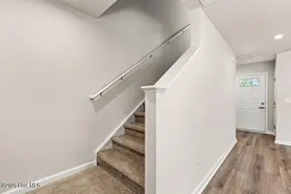 8035 Sterling Oak Drive NW, Ash, NC 28420 – photo 14: stairs (2)