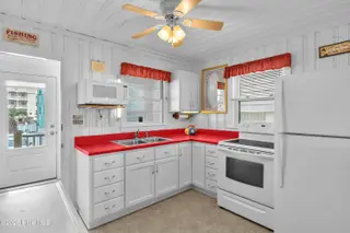107 Carolina Beach Avenue S, Carolina Beach, NC 28428 – photo 15: Kitchen & Entry 1