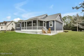 5016 Robert Ruark Drive SE, Southport, NC 28461 – photo 2: Spring 5016RobertRuarkDriveSoutheast-1 (
