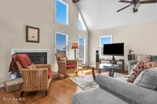6707 Kings Lynn Drive, Oak Island, NC 28465 – photo 7: 6707 tv