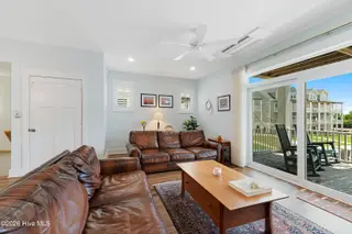 200 Olde Towne Yacht Club Drive 27 Inlet Cove/Slip 84, Morehead City, NC 28557 – photo 6: Living room with marina views