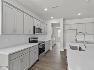 3221 Butterfly Ginger Street Lot 74, Leland, NC 28451 — 4-bedroom home in Indigo Preserve, Leland, NC, photo 16 of 60