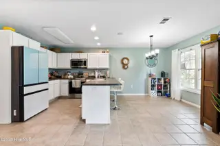2947 Bay Village Street, Shallotte, NC 28470 — 3-bedroom home in Green Bay Village, Shallotte, NC, photo 13 of 33: Combo kitchen/dining