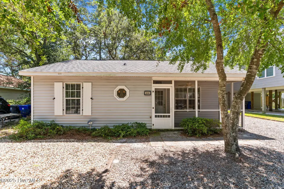 214 NE 59th Street, Oak Island, NC 28465 – photo 1 of 50: primary photo