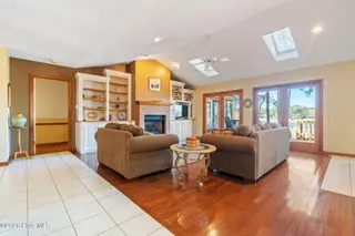 1461 S Shore Drive, Southport, NC 28461 – photo 13: Living Room Lookin Out