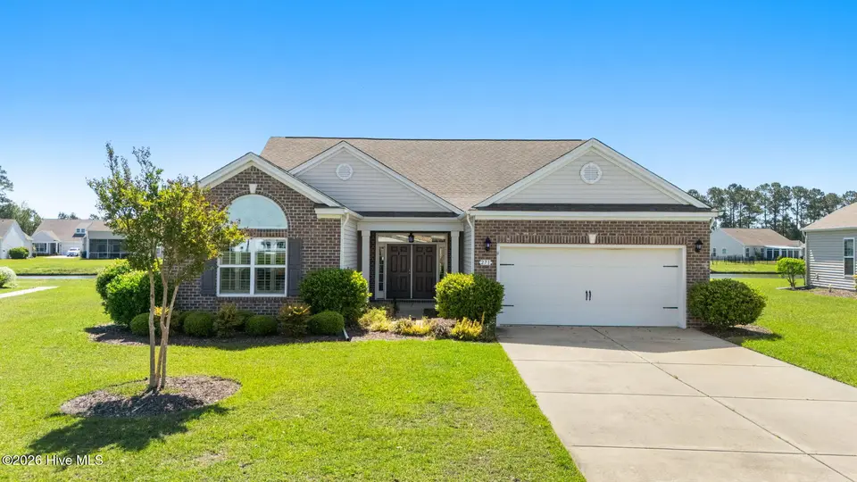 271 Cable Lake Circle, Calabash, NC 28467 – photo 1 of 37: 2-web-or-mls-DJI_20260414113831_0010_D