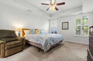 256 Downing Glen Place, Calabash, NC 28467 — 4-bedroom home in The Farm, Calabash, NC, photo 16 of 42: Primary bedroom