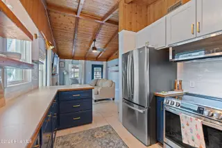318 NE 58th Street, Oak Island, NC 28465 – photo 20